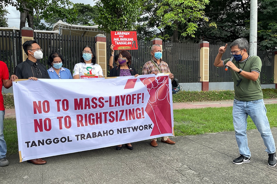 Some government employees stage a protest against the Marcos administration's 'rightsizing' proposal on July 20, 2022. Anjo Bagaoisan, ABS-CBN News