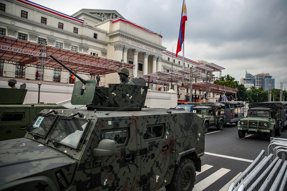 Members of the various components of the Armed Forces of the Philippines and civilian security forces rehearse for the Civic and Military parade in front of the National Museum in Manila. Jonathan Cellona, ABS-CBN News/file