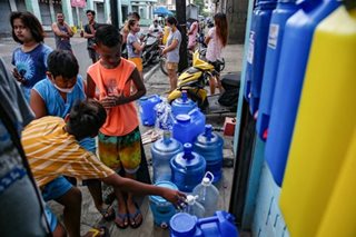 Bangued residents line up for free drinking water