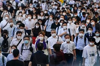 Japan to treat COVID-19 like seasonal flu