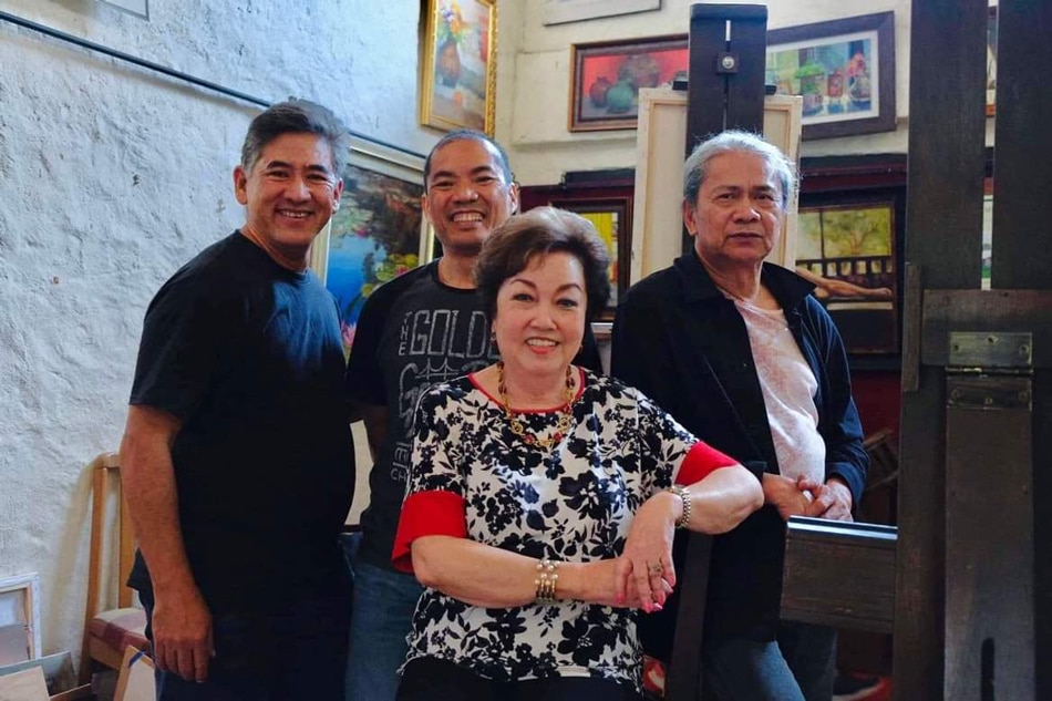 Watercolor artists (from left) Gerardo Jimenez, Alfred Galura and Rene Canlas with L'Arc en Ciel Gallery owner and exhibit curator Elaine Ongin Hermosa. Handout