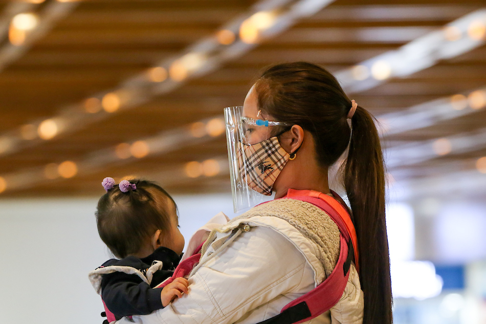 Overseas Filipino Workers arrive at the lobby of the Ninoy Aquino International Airport Terminal 1 in Parañaque City on July 1, 2021. Jonathan Cellona, ABS-CBN News/File