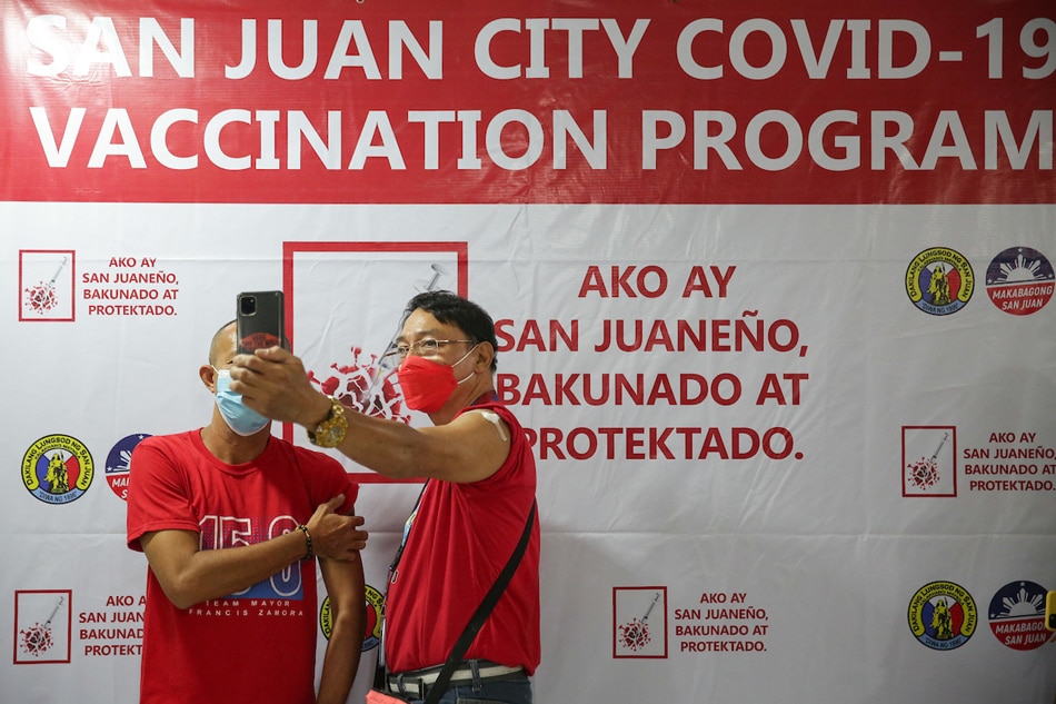 San Juan residents line up to get their second booster shots against COVID-19 at the VMall, Greenhills on July 28, 2022. George Calvelo, ABS-CBN News/File