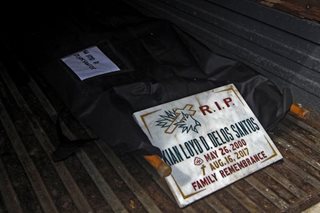 Remains of drug-war fatality Kian delos Santos exhumed