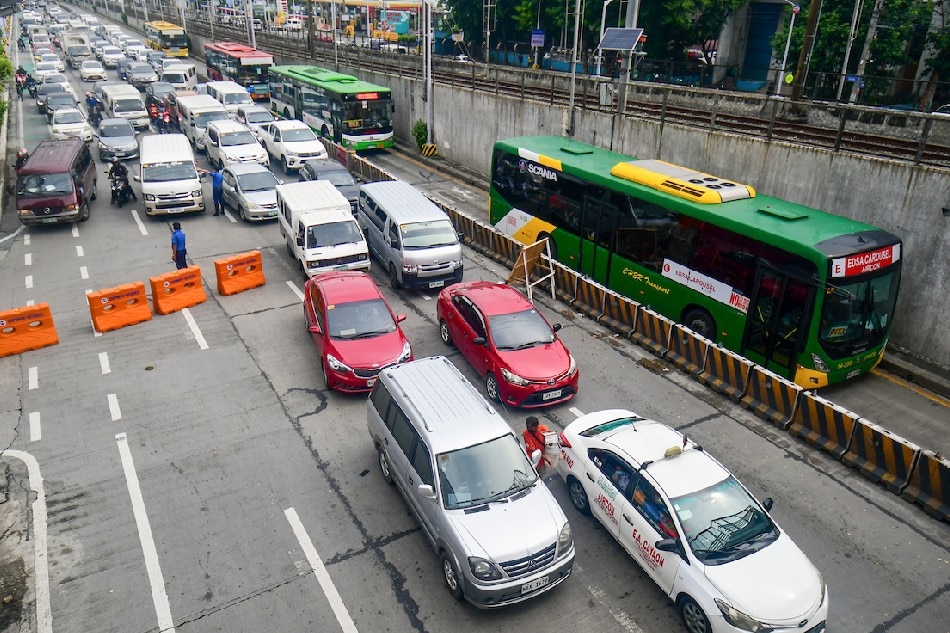 Traffic builds up along EDSA before the EDSA-Kamuning flyover southbound in Quezon City on June 27, 2022, as authorities fix large cracks and potholes in the flyover that would last for a month. Mark Demayo, ABS-CBN News/file