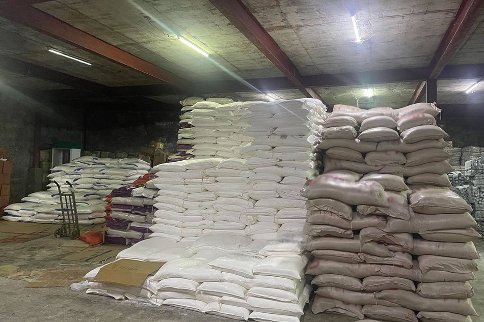 Thousands of sacks of suspected smuggled sugar were discovered inside a warehouse in San Fernando City, Pampanga on Aug. 18, 2022. Photo from the Office of the Press Secretary