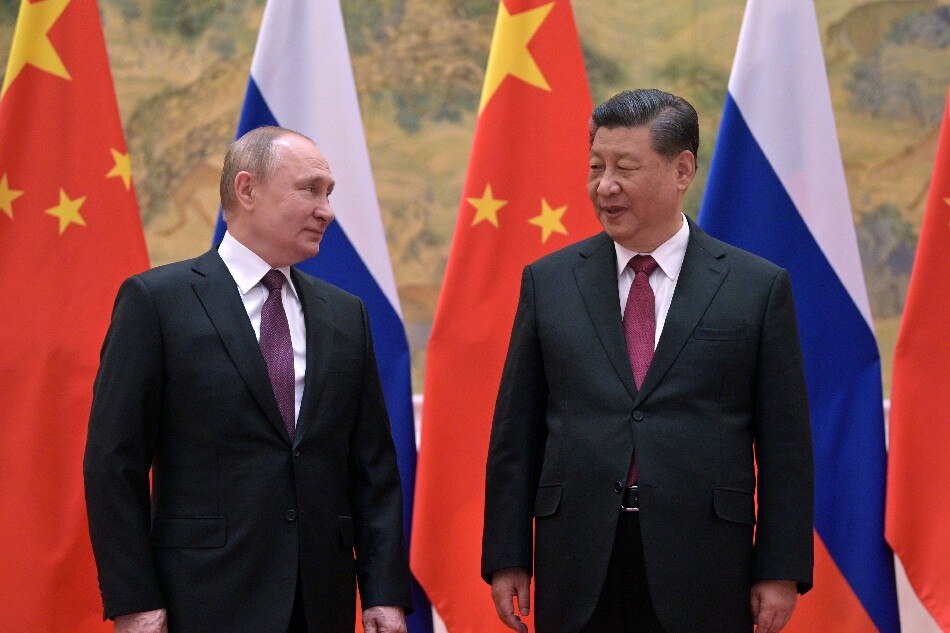 Russian President Vladimir Putin (L) and Chinese President Xi Jinping (R) pose for a picture during their meeting in Beijing, China, 04 February 2022. Putin arrived in China on the day of the Beijing 2022 Winter Olympic Games opening ceremony.   Alexei Druzhinn, Kremlin/Sputnik/Pool via EPA-EFE