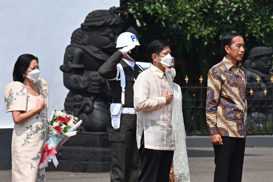 Visiting Philippine President Ferdinand Marcos Jr. (front C) and First Lady Louise Araneta Marcos (L) attend a welcome ceremony with Indonesiaís President Joko Widodo (R) and First Lady Iriana Widodo (2nd R, obscured) at the Presidential Palace in Bogor, West Java on September 5, 2022. Adek Berry, AFP/Pool
