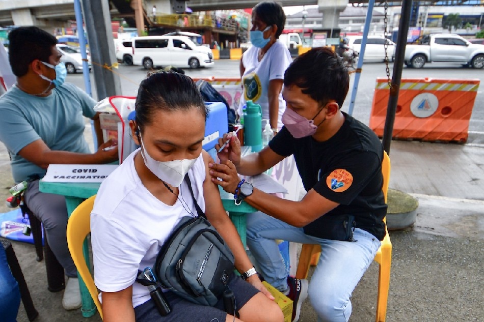 A pop-up COVID-19 vaccination site under Barangay Culiat's health center offers booster shots in Quezon City on Sept. 5, 2022. Mark Demayo, ABS-CBN News