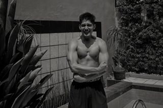 Robi Domingo flexes muscles in rare topless photo