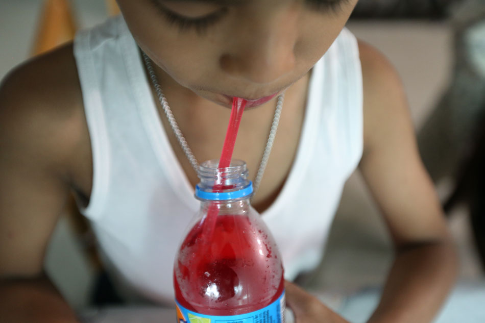  A Thai child consumes a soft drink in Bangkok, Thailand, Feb. 21, 2019. Thailand faces a diabetes crisis due to high rates of sugar consumption. The disease, which according to the experts is more widespread among minors and the elderly, affects more than 4.8 million Thais, or about seven percent of the total population of the country. Narong Sangnak, EPA-EFE