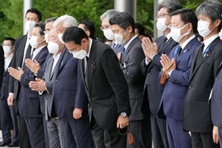 Japan asks foreign guests to wear face masks at Abe's state funeral