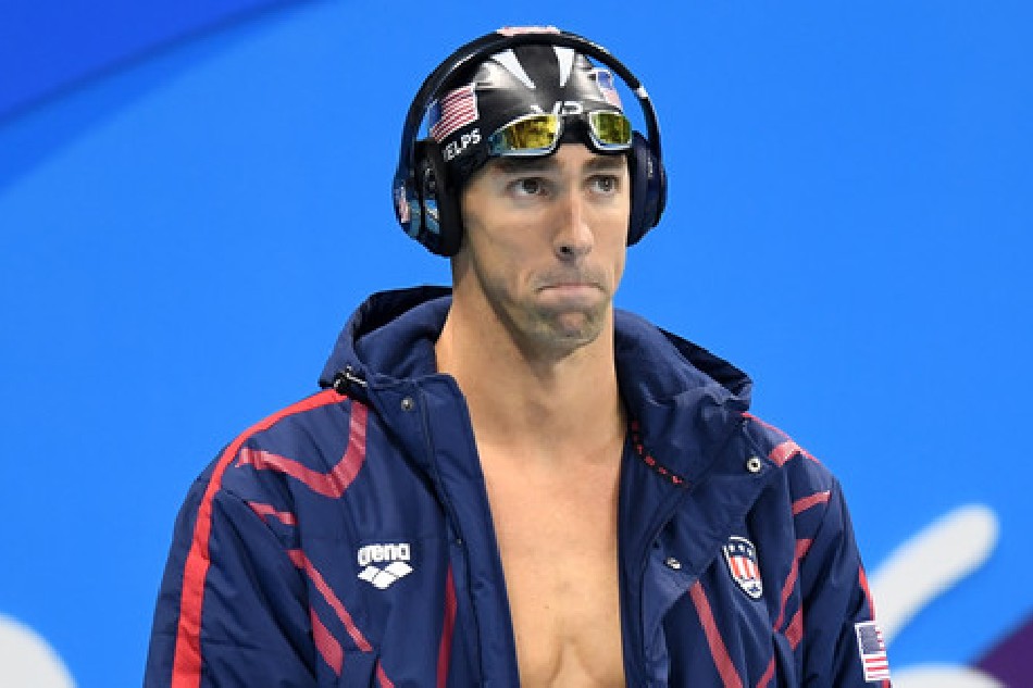 Michael Phelps prepares for the men's 100m butterfly final at the Rio 2016 Olympic Games on August 12, 2016. Bernd Thissen, EPA/file