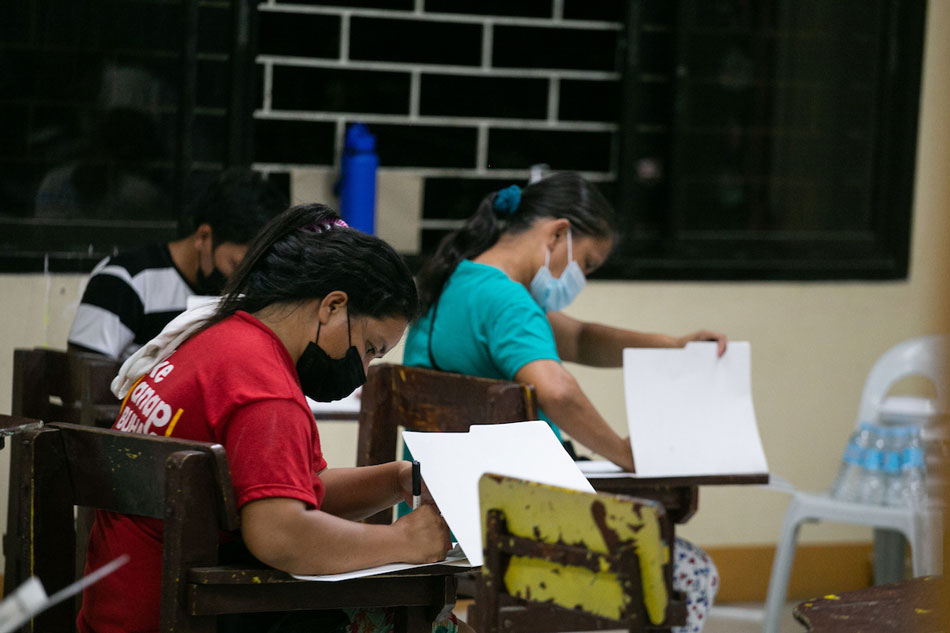 Voters cast their ballots at the Kamuning Elementary School, Quezon City on May 9, 2022. Gigie Cruz, ABS-CBN News/file 