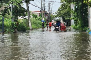 Some Malabon streets flooded due to Karding, high tide