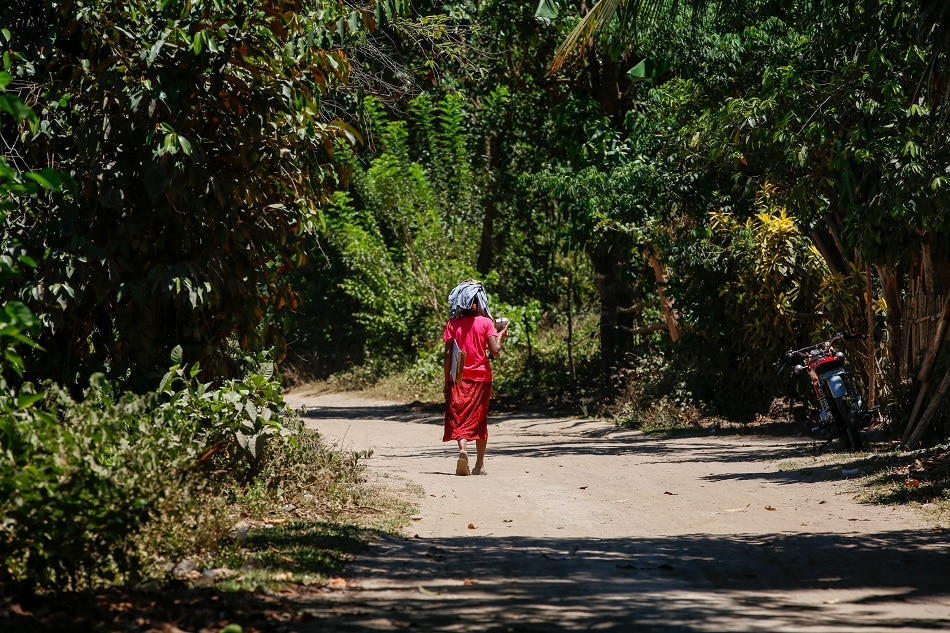 Adeling Delos Santos from the Indigenous People's group Dumagat-Remontado, walks home from Sitio Apia in Barangay Calawis, Antipolo, Rizal on April 24, 2020. Jonathan Cellona, ABS-CBN News/file