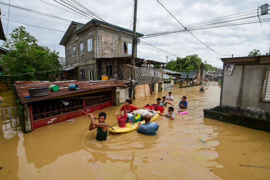 Waist- to chest-deep floods inundate a residential area in Barangay Poblacion, San Miguel, Bulacan after it was hit by Typhoon Karding on Sept. 26, 2022. Mark Demayo, ABS-CBN News/file