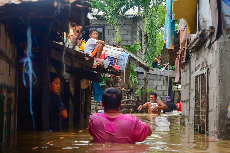 Deep floods inundate residential homes in Brgy. Poblacion, San Miguel, Bulacan on September 26, 2022. Mark Demayo, ABS-CBN News