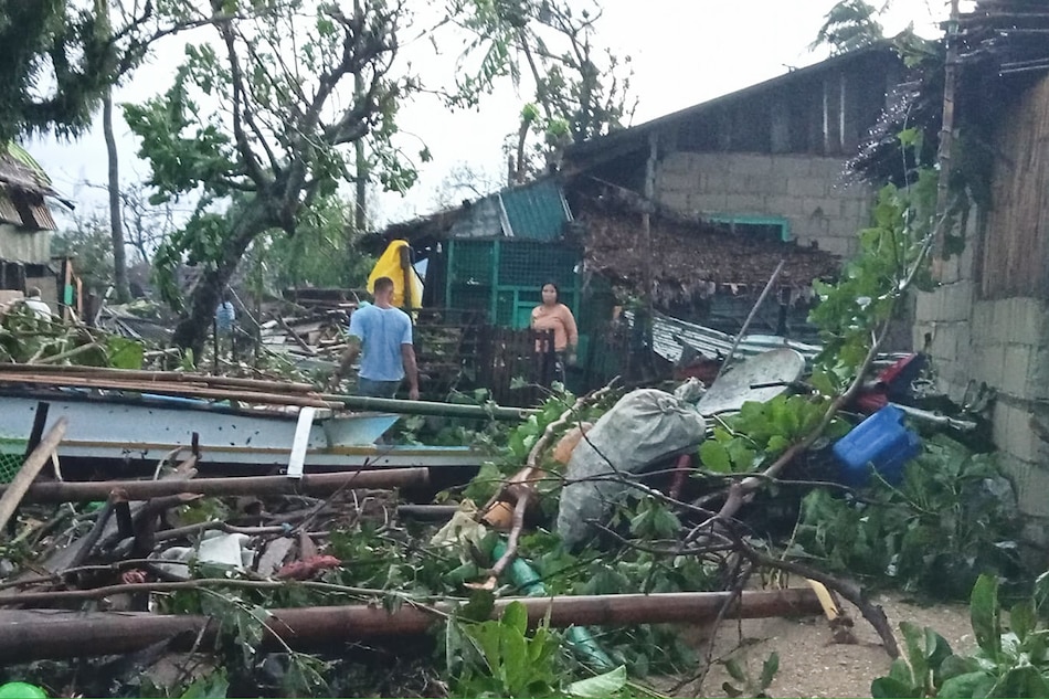 Residents inspect the damage caused by Super Typhoon Karding on September 26, 2022, a day after it made landfall in Burdeos, Polillo Islands in Quezon Province. Courtesy of Kevin Morillo
