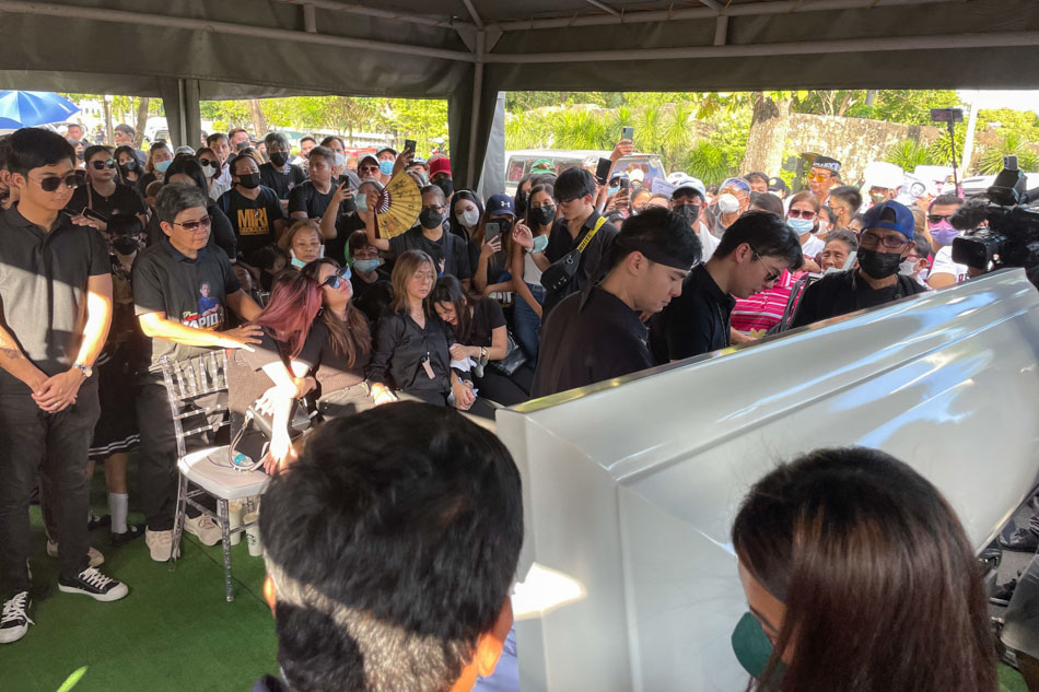 The family, friends and supporters of Percy Mabasa, also known as Percy Lapid, pay their last respects to the slain journalist during the funeral rites at the Manila Memorial Park in Paranaque on Sunday. Mourners called for justice for Mabasa who was gunned down by 2 unidentified assailants in Las Pinas last October 3, 2022. Anjo Bagaoisan, ABS-CBN News