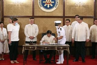 Marcos signs SIM registration law