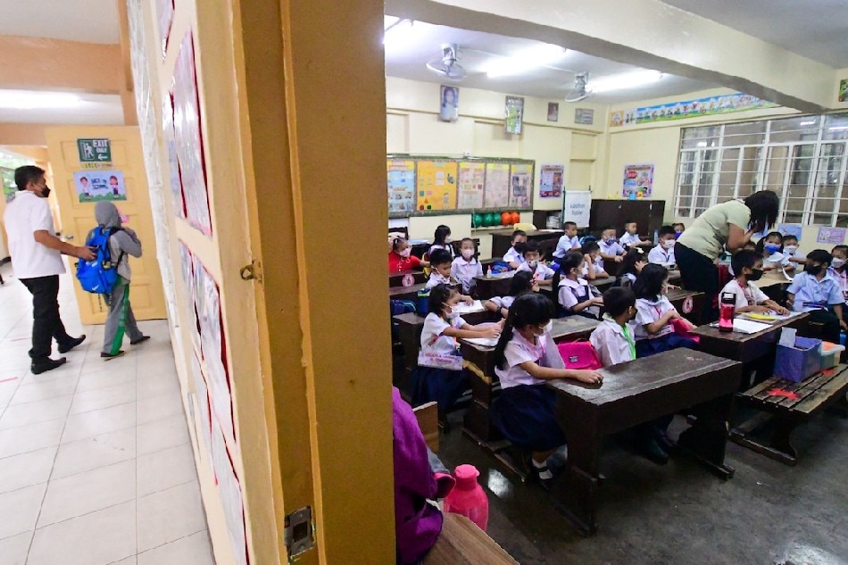 Students arrive for their class at the Payatas B Elementary School in Quezon City on the first day of face-to-face classes in all levels, August 22, 2022. Mark Demayo, ABS-CBN News/File