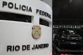 Brazil ex-legislator attacks police with gun, grenades