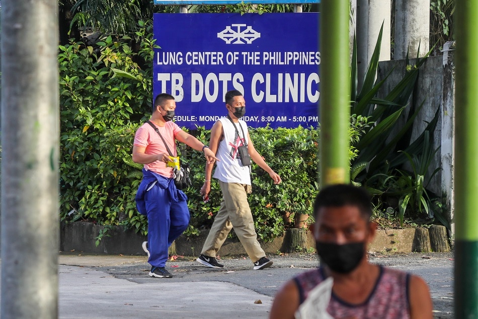 People pass beside the Lung Center of the Philippines in Quezon City on September 27, 2021. Jonathan Cellona, ABS-CBN News/file