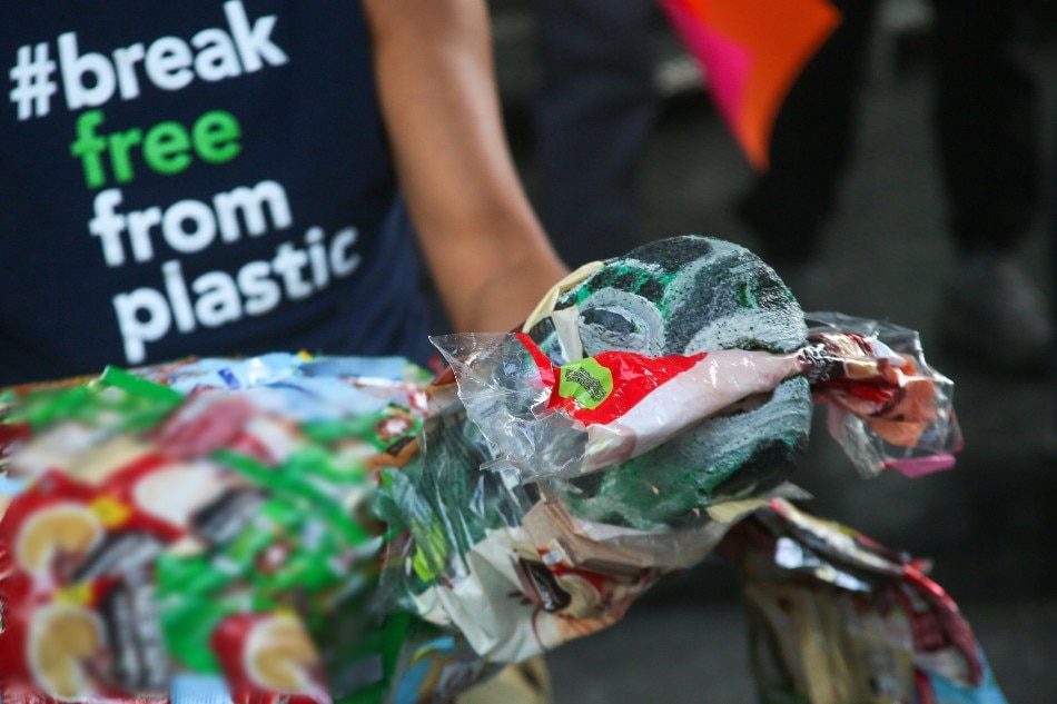 Environmental activists protest the impacts of plastic wastes to the marine environment on March 23, 2022. Jonathan Cellona, ABS-CBN News/file