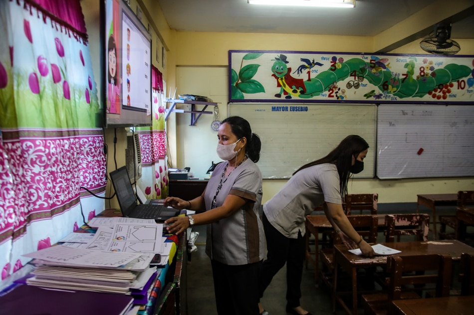 Teachers attend to their classrooms at the Francisco Legaspi Memorial School in Pasig City on November 2, 2022. Jonathan Cellona, ABS-CBN News/File