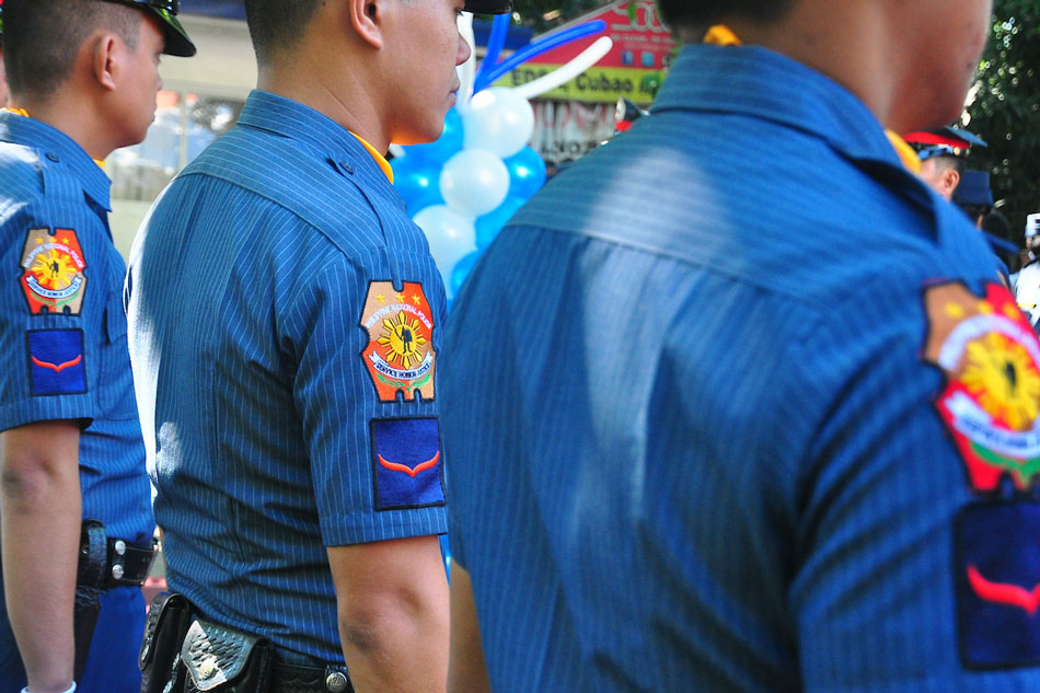 PNP officers on standby during the inauguration and blessing of the new Cubao Station in Quezon City on Thursday. Mark Demayo, ABS-CBN News/File.