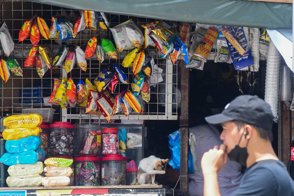 Junk food hangs outside a sari-sari store in Quezon City on Sept. 12, 2022. Mark Demayo, ABS-CBN News