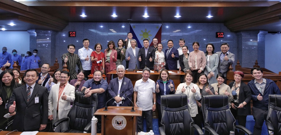 Senators, led by Senate President Juan Miguel “Migz” F. Zubiri pose for a traditional photo-op with Senate officials and staff headed by Sec. Renato Bantug after the chamber ends its marathon plenary debates on the proposed 2023 national budget Friday, Nov. 18, 2022. Joseph Vidal/Senate PRIB