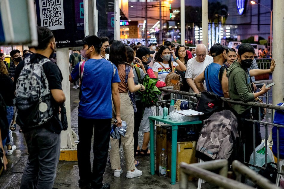 Commuters line up for a ride at a terminal in Cubao, Quezon City on October 28, 2022. George Calvelo, ABS-CBN News/file