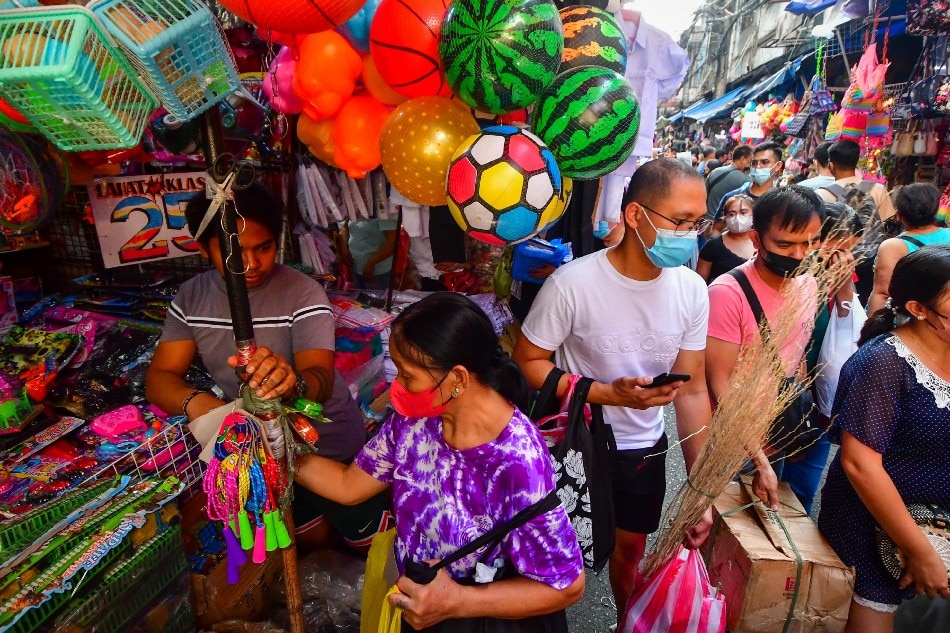 Shoppers check toys and gifts for sale at the Divisoria market area in Manila on November 27, 2022. Mark Demayo, ABS-CBN News
