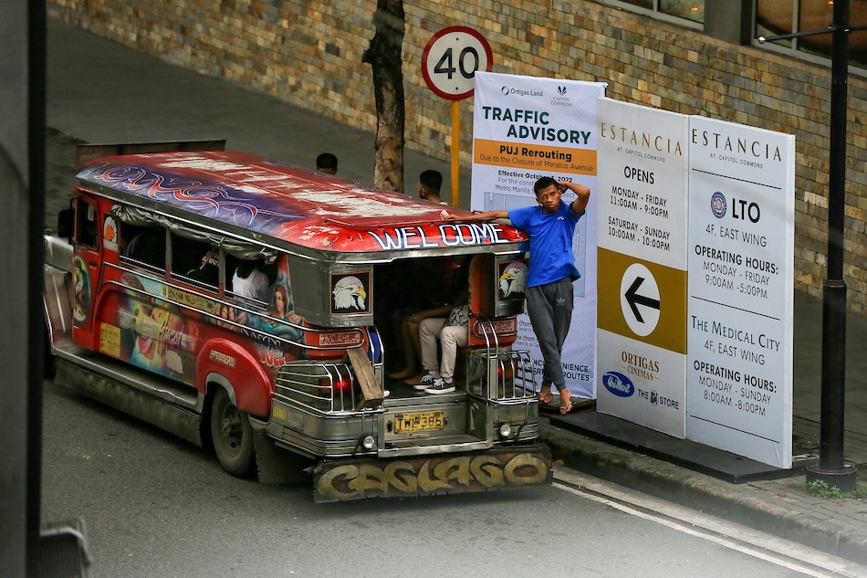 A public utility jeepney waits for passengers at the corner of Shaw Boulevard and Meralco Avenue in Pasig City on October 3, 2022 hours before its closure to traffic to give way to the construction of 2 Metro Manila subway stations. Jonathan Cellona, ABS-CBN News