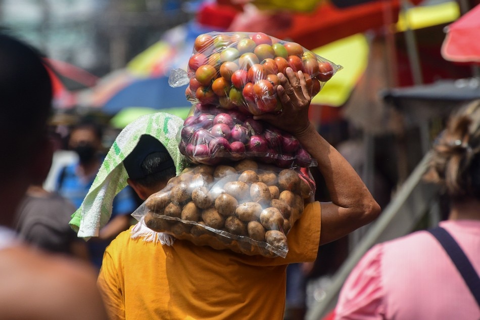 Produce go for sale at a market in Manila on October 12, 2022. Mark Demayo, ABS-CBN News