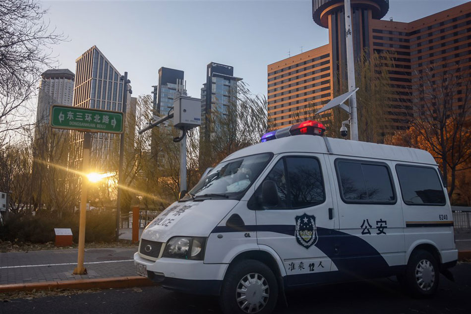  A police vehicle is parked at an area where protests were held in Beijing, China on November 29, 2022. Mark R. Cristino, EPA-EFE/File