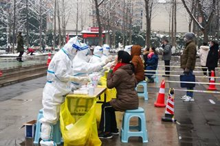 Chinese city tests residents for COVID-19