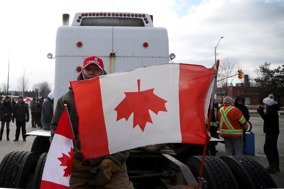 Canada Anti Vax Truckers Defy Order To Clear Bridge Abs Cbn News 