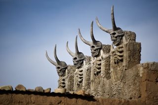 Bolivian house with devil sculptures spooks city
