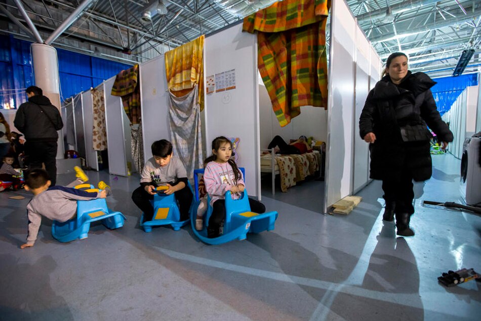 Ukrainian refugees children play at one of the refugee camps created at MoldExpo exhibition center, in Chisinau, Moldova, 01 March 2022. Dumitru Doru/EPA
