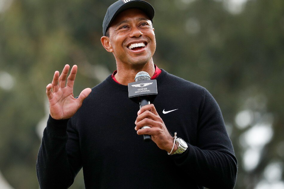 US golfer Tiger Woods speaks during a trophy ceremony for Chilean golfer Joaquin Niemann during round four of the Genesis Invitational at the Riviera Country Club in Los Angeles, California, USA, 20 February 2022. Caroline Brehman, EPA-EFE.