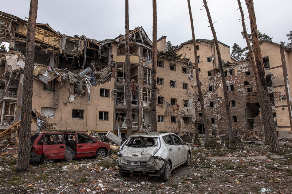 Destroyed cars are seen next to residential buildings damaged by heavy shelling in Irpin city, Kyiv (Kiev) province, Ukraine, on March 3, 2022. Shelling and aerial bombardment by Russian troops have resulted in the deaths of civilians even as Russia said its targets are military installations. Roman Pipley, EPA-EFE