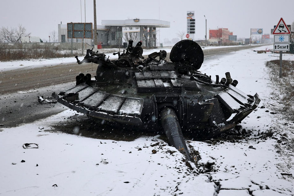 A turret of burned Russian tank is left abandoned after the Ukrainian army attacked it the previous day near the city of Kharkiv, Ukraine, on February 25, 2022. Sergey Kozlov, EPA-EFE 