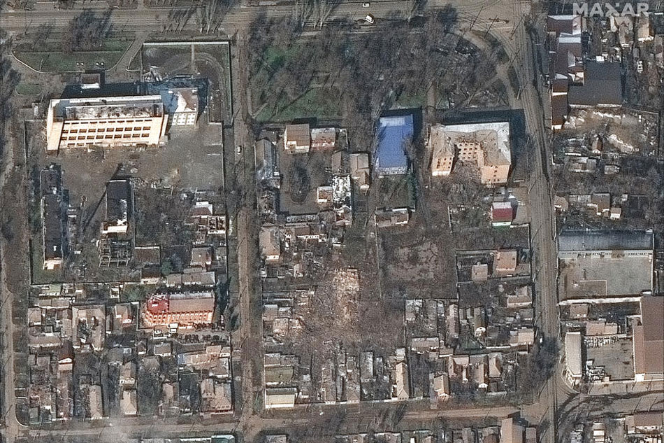 A handout satellite image made available by Maxar Technologies shows destroyed buildings and homes in Mariupol, Ukraine, on March 9, 2022. Extensive damage is noted to the civilian infrastructure in and around the city, including residential homes, high-rise apartment buildings, grocery stores and shopping centers, Maxar says. Maxar Technologies Handout/ EPA-EFE