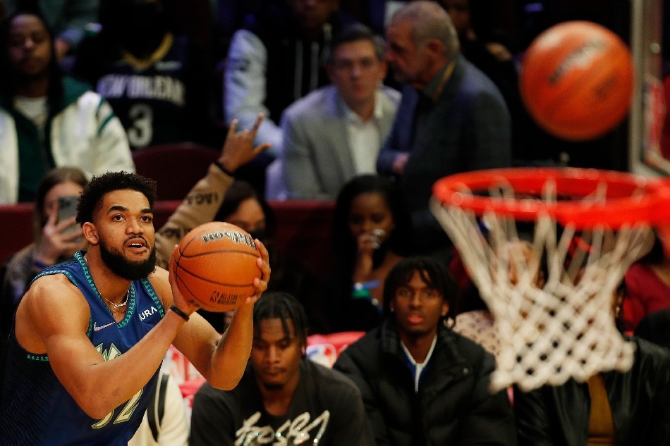 Minnesota Timberwolves center Karl-Anthony Towns competes in the Three Point Contest during All-Star Saturday Night as part of the NBA All-Star weekend at Rocket Mortgage Fieldhouse in Cleveland, Ohio, USA, 19 February 2022. File photo. David Maxwell, EPA-EFE