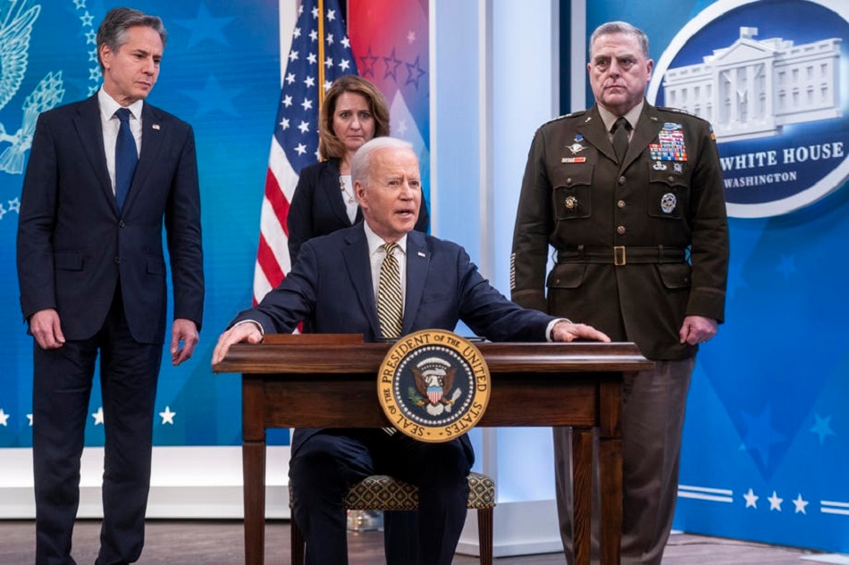 US President Joe Biden, with Secretary of State Antony Blinkin (from left), Deputy Secretary of Defense Kathleen Hicks, and Chairman of the Joint Chiefs of Staff General Mark Milley, signs a delegation authority for $800 million of military assistance to Ukraine during a ceremony in the South Court Auditorium of the White House in Washington, DC, March 16, 2022. Biden's remarks follow Ukrainian President Volodymyr Zelensky's emotional virtual address to Congress, asking for help in defending against the Russian invasion. Shawn Thew, EPA-EFE
