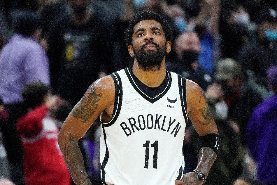 Brooklyn Nets guard Kyrie Irving walks back onto the court in the final minutes against the Sacramento Kings 02 February 2022. John Mabanglo, EPA-EFE