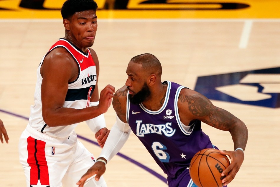Los Angeles Lakers forward LeBron James (R) in action against Washington Wizards forward Rui Hachimura during the second quarter of the NBA game between the Los Angeles Lakers and the Washington Wizards at the Crypto.com Arena in Los Angeles, California, USA, 11 March 2022. File photo. Etienne Laurent, EPA-EFE